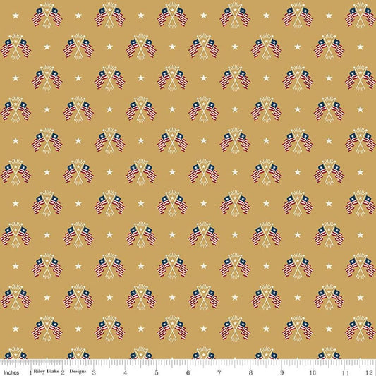 Image of Independence Old Glory Gold quilting cotton fabric by The RBD Designers for Riley Blake Designs. Features flags on a yellow background. Cute Little Fabric Shop.