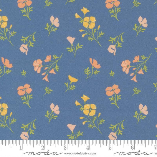Image of Cannon Beach Astoria Lake quilting cotton fabric by Crystal Manning for Moda Fabrics. Features flowers on a blue background. Cute Little Fabric Shop.