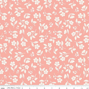 Image of Meadow Moments Drifting Blooms Coral quilting cotton pattern by Little Forest Atelier for Riley Blake Designs. Features flowers on a pink background. Cute Little Fabric Shop.
