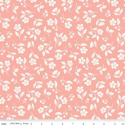 Image of Meadow Moments Drifting Blooms Coral quilting cotton pattern by Little Forest Atelier for Riley Blake Designs. Features flowers on a pink background. Cute Little Fabric Shop.