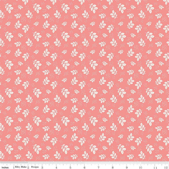 Image of Renew Leaves Coral quilting cotton fabric by Sandy Gervais for Riley Blake Designs. Features leaves on a pink background. Cute Little Fabric Shop.