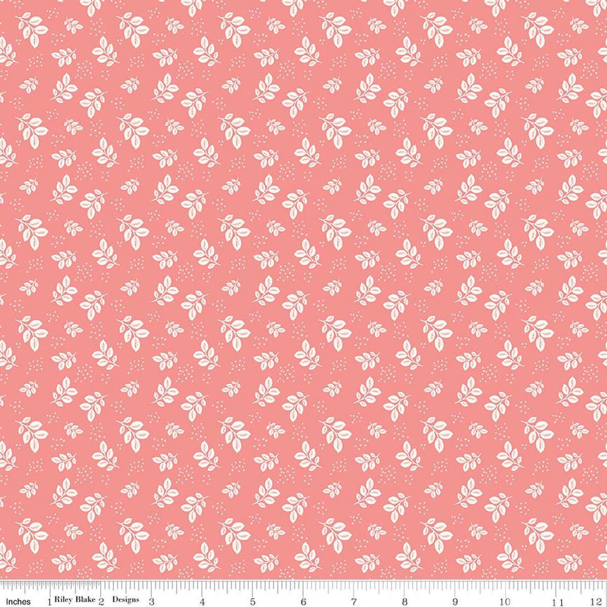 Image of Renew Leaves Coral quilting cotton fabric by Sandy Gervais for Riley Blake Designs. Features leaves on a pink background. Cute Little Fabric Shop.