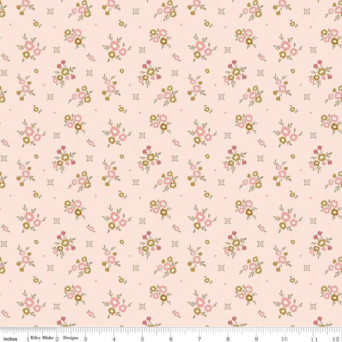 Image of Renew Floral Pink quilting cotton fabric by Sandy Gervais for Riley Blake Designs. Features flowers on a pink background. Cute Little Fabric Shop.