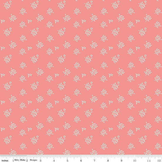 Image of Renew Ditsy Coral quilting cotton fabric by Sandy Gervais for Riley Blake Designs. Features flowers on a pink background. Cute Little Fabric Shop.