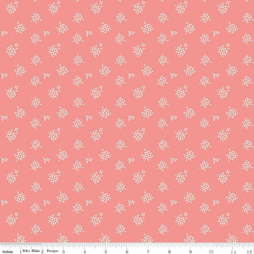 Image of Renew Ditsy Coral quilting cotton fabric by Sandy Gervais for Riley Blake Designs. Features flowers on a pink background. Cute Little Fabric Shop.