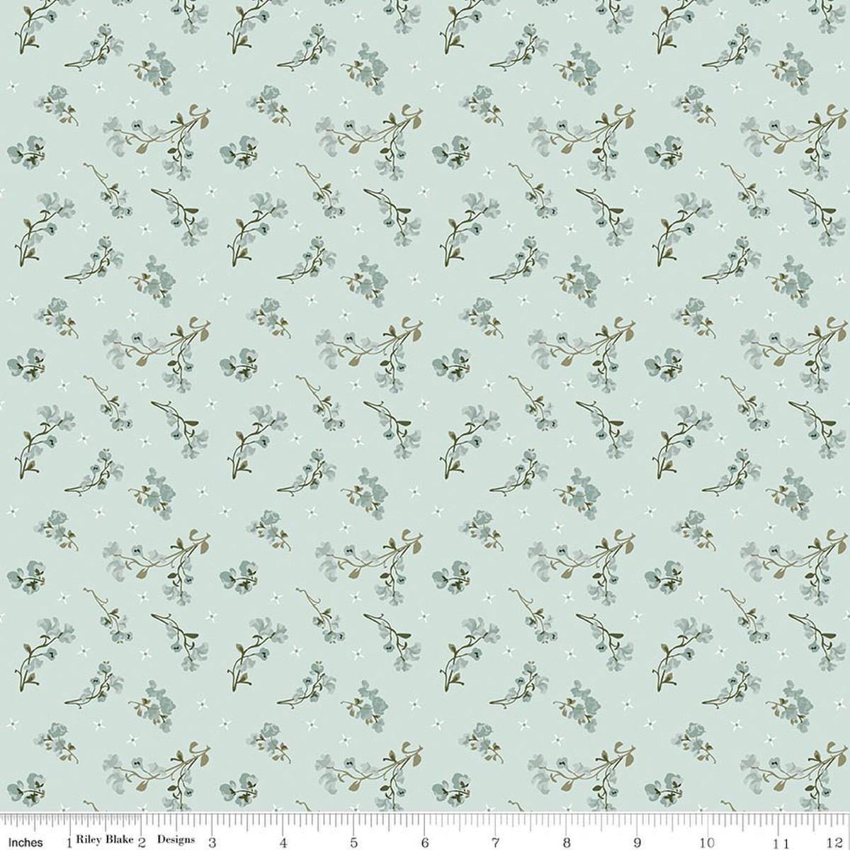 Image of Renew Sweet Pea Bleached Denim quilting cotton fabric by Sandy Gervais for Riley Blake Designs. Features flowers on a blue background. Cute Little Fabric Shop.
