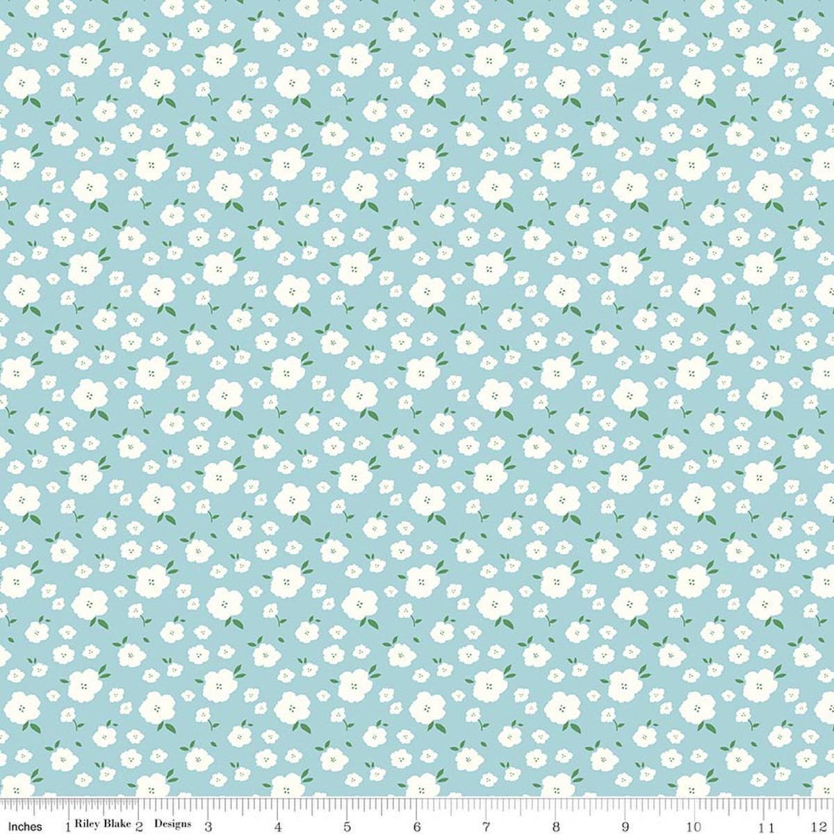 Image of Serendipity 2 Flower Bed Powder quilting cotton fabric by Minki Kim for Riley Blake Designs. Features flowers on a blue background. Cute Little Fabric Shop.