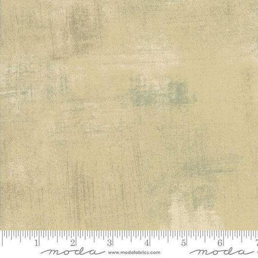 Image of Grunge Basics Tan quilting cotton fabric by Moda for Moda Fabrics. Features printed texture on a cream background. Cute Little Fabric Shop.