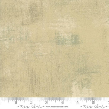Image of Grunge Basics Tan quilting cotton fabric by Moda for Moda Fabrics. Features printed texture on a cream background. Cute Little Fabric Shop.