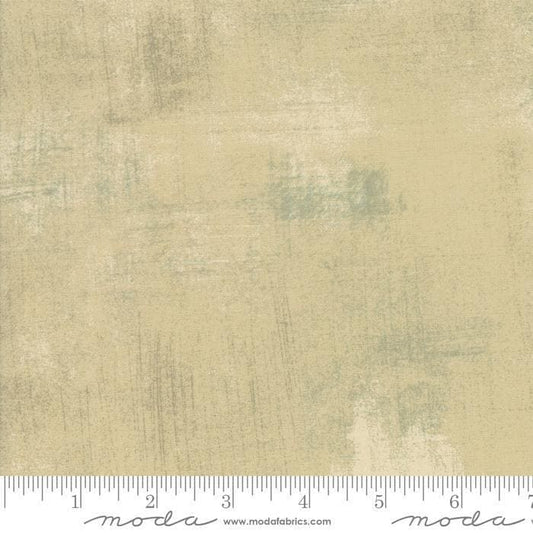 Image of Grunge Basics Tan quilting cotton fabric by Moda for Moda Fabrics. Features printed texture on a cream background. Cute Little Fabric Shop.