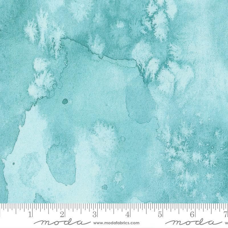 Image of Flow Basics Seafoam quilting cotton fabric by Create Joy Project for Moda Fabrics. Features abstract watercolor on a blue background. Cute Little Fabric Shop.