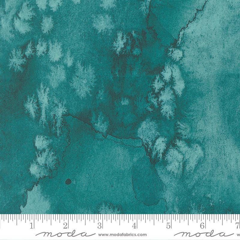 Image of Flow Basics Turquoise quilting cotton fabric by Create Joy Project for Moda Fabrics. Features abstract watercolor on a blue background. Cute Little Fabric Shop.