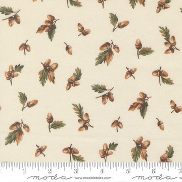 Image of Wild Blue Yonder Acorn Cloud quilting cotton fabric by Moda Fabrics. Features acorns on a cream background. Cute Little Fabric Shop.
