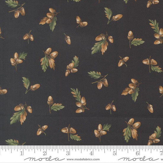 Image of Wild Blue Yonder Acorn Midnight quilting cotton fabric by Moda Fabrics. Features acorns on a blue background. Cute Little Fabric Shop.