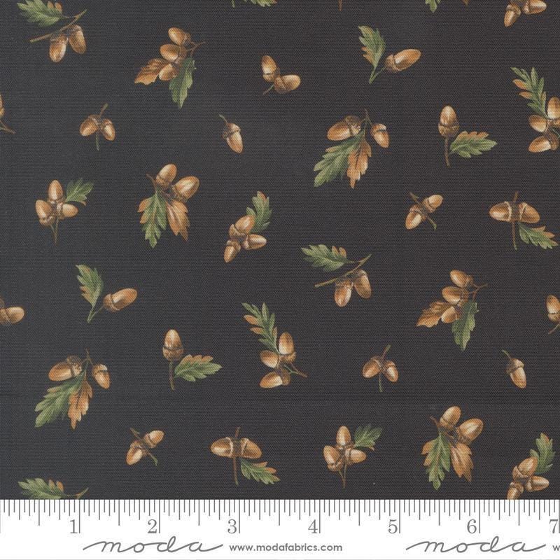 Image of Wild Blue Yonder Acorn Midnight quilting cotton fabric by Moda Fabrics. Features acorns on a blue background. Cute Little Fabric Shop.