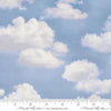 Image of Wild Blue Yonder Clouds Sky quilting cotton fabric by Moda Fabrics. Features clouds on a blue background. Cute Little Fabric Shop.