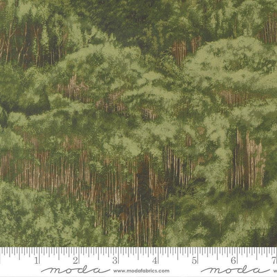 Image of Wild Blue Yonder Foliage Pine quilting cotton fabric by Moda Fabrics. Features trees on a green background. Cute Little Fabric Shop.