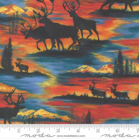 Image of Wild Blue Yonder Silhouettes Sunset quilting cotton fabric by Moda Fabrics. Features animals on an orange background. Cute Little Fabric Shop.
