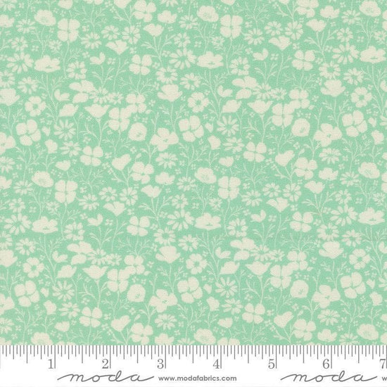 Image of Cannon Beach Blooms Pond quilting cotton fabric by Crystal Manning for Moda Fabrics. Features flowers on a green background. Cute Little Fabric Shop.