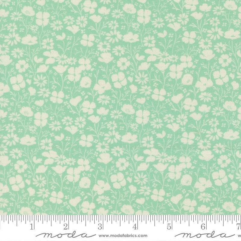 Image of Cannon Beach Blooms Pond quilting cotton fabric by Crystal Manning for Moda Fabrics. Features flowers on a green background. Cute Little Fabric Shop.