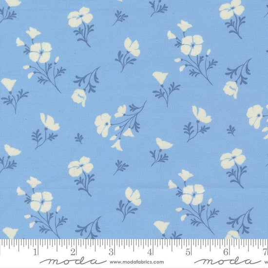Image of Cannon Beach Astoria Sky quilting cotton fabric by Crystal Manning for Moda Fabrics. Features flowers on a blue background. Cute Little Fabric Shop.
