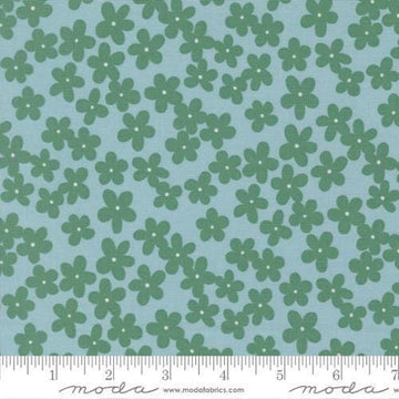 Image of True to Hue Petal Dusty Sky quilting cotton fabric by Alli K Design for Moda Fabrics. Features flowers on a blue background. Cute Little Fabric Shop.
