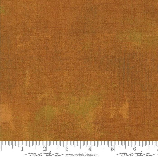 Image of Grunge Basics Yam quilting cotton fabric by Moda for Moda Fabrics. Features printed texture on an orange background. Cute Little Fabric Shop.