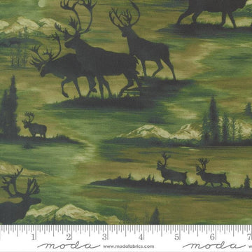 Image of Wild Blue Yonder Silhouettes Pine quilting cotton fabric by Moda Fabrics. Features animals on a green background. Cute Little Fabric Shop.