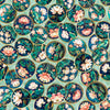 Image of Serenity Lotus Circle Vignettes Mint quilting cotton fabric by Morris Creative Group for QT Fabrics. Features flowers on a blue background. Cute Little Fabric Shop