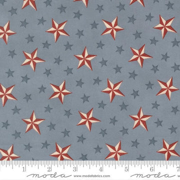 Image of America 250 Years Tossed Stars Steel Blue quilting cotton fabric by Deb Strain for Moda Fabrics. Features stars on a blue background. Cute Little Fabric Shop.
