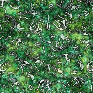 Image of Savage Kingdom Dino Bones Green quilting cotton fabric by Dan Morris for QT Fabrics. Features dinosaur bones on a green background. Cute Little Fabric Shop.