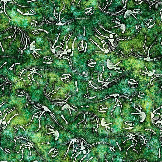 Image of Savage Kingdom Dino Bones Green quilting cotton fabric by Dan Morris for QT Fabrics. Features dinosaur bones on a green background. Cute Little Fabric Shop.