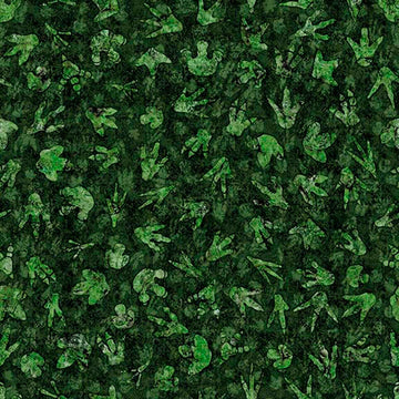 Image of Savage Kingdom Dino Tracks Forest quilting cotton fabric by Dan Morris for QT Fabrics. Features dinosaur footprints on a green background. Cute Little Fabric Shop.