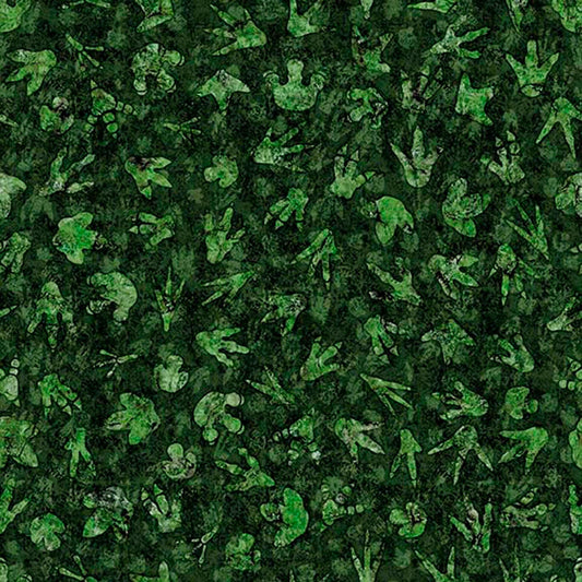 Image of Savage Kingdom Dino Tracks Forest quilting cotton fabric by Dan Morris for QT Fabrics. Features dinosaur footprints on a green background. Cute Little Fabric Shop.