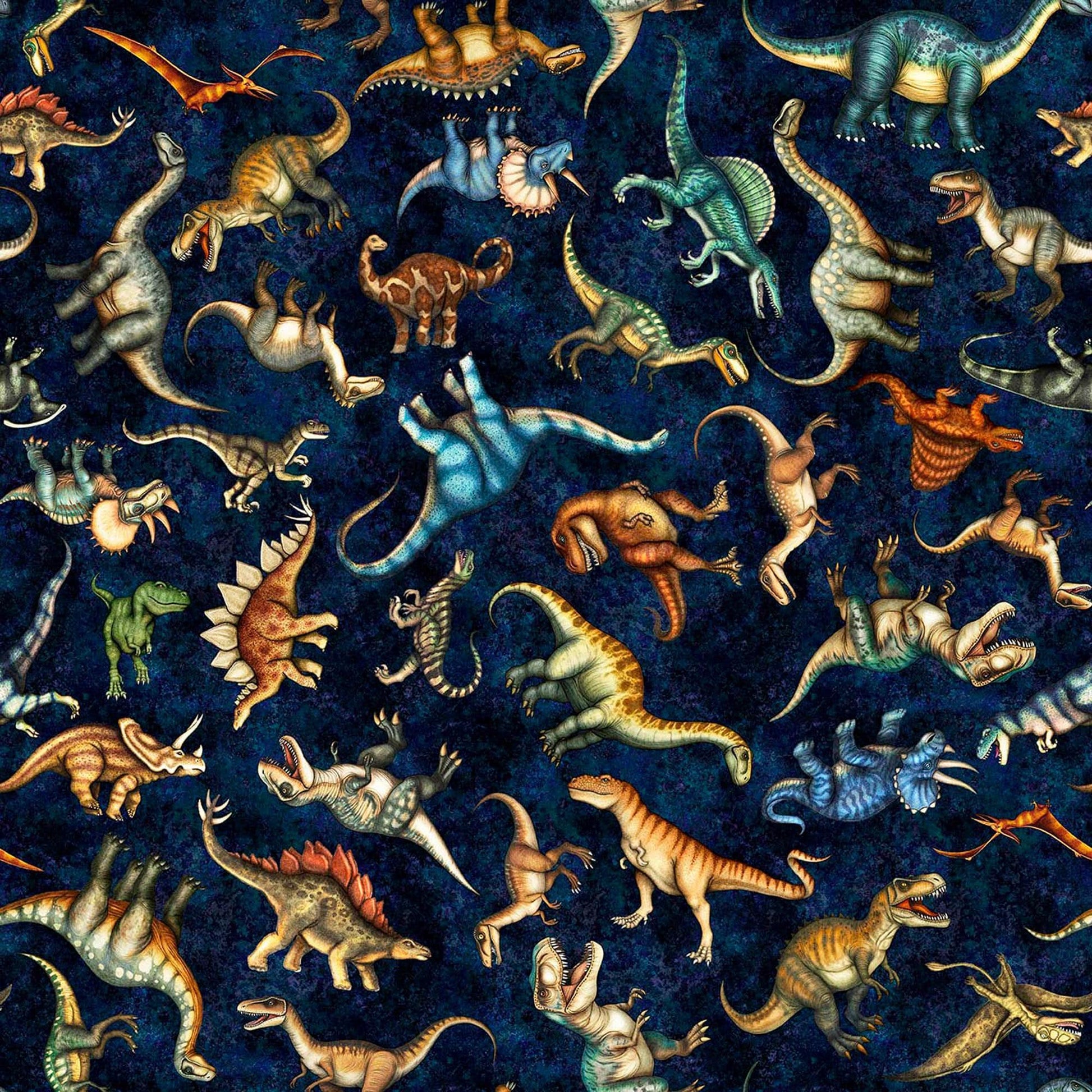 Image of Savage Kingdom Tossed Dinosaurs Dark Navy quilting cotton fabric by Dan Morris for QT Fabrics. Features dinosaurs on a blue background. Cute Little Fabric Shop.