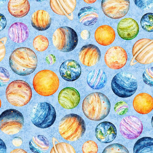 Image of QT Cuties 3 Planets Light Blue quilting cotton fabric by Morris Creative Group for QT Fabrics. Features planets on a blue background. Cute Little Fabric Shop.
