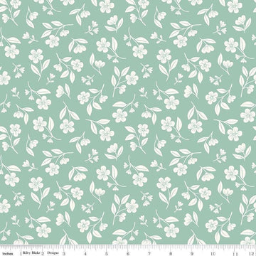 Image of Meadow Moments Drifting Blooms Mint quilting cotton pattern by Little Forest Atelier for Riley Blake Designs. Features flowers on a green background. Cute Little Fabric Shop.
