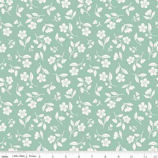 Image of Meadow Moments Drifting Blooms Mint quilting cotton pattern by Little Forest Atelier for Riley Blake Designs. Features flowers on a green background. Cute Little Fabric Shop.