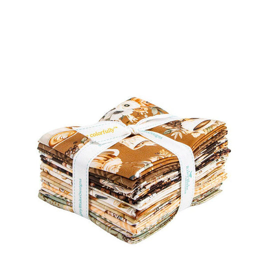 A bundle of fabric swatches tied together with a white ribbon, displaying a variety of colors and patterns.