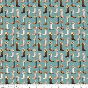 Image of Cowgirl Boots Blue quilting cotton fabric by Echo Park Paper Co. for Riley Blake Designs. Features cowboy boots on a blue background. Cute Little Fabric Shop.