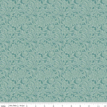 Image of Cowgirl Leather Blue quilting cotton fabric by Echo Park Paper Co. for Riley Blake Designs. Features tone-on-tone flowers on a blue background. Cute Little Fabric Shop.
