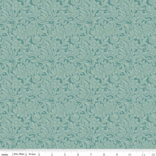Image of Cowgirl Leather Blue quilting cotton fabric by Echo Park Paper Co. for Riley Blake Designs. Features tone-on-tone flowers on a blue background. Cute Little Fabric Shop.
