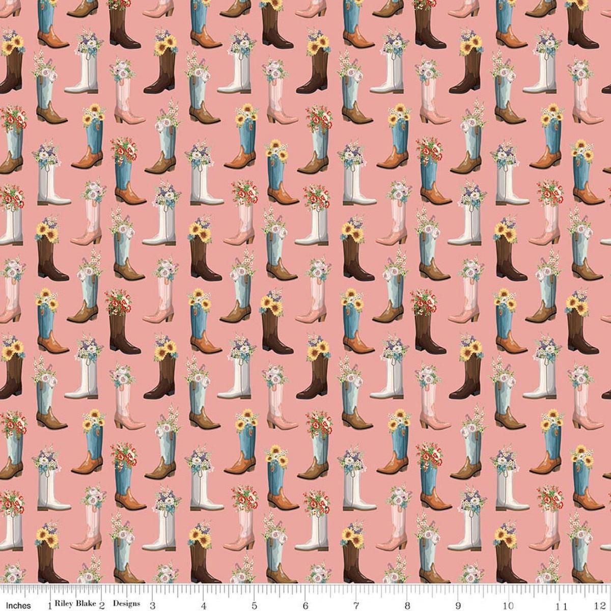 Image of Cowgirl Boots Pink quilting cotton fabric by Echo Park Paper Co. for Riley Blake Designs. Features cowboy boots on a pink background. Cute Little Fabric Shop.