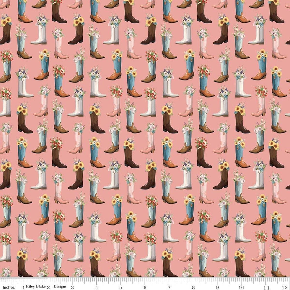 Image of Cowgirl Boots Pink quilting cotton fabric by Echo Park Paper Co. for Riley Blake Designs. Features cowboy boots on a pink background. Cute Little Fabric Shop.