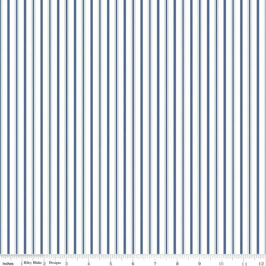 Image of Daybreak on the Prairie Track Stripe Blue quilting cotton fabric by Modern Prairie for Riley Blake Designs. Features stripes on a blue background. Cute Little Fabric Shop.