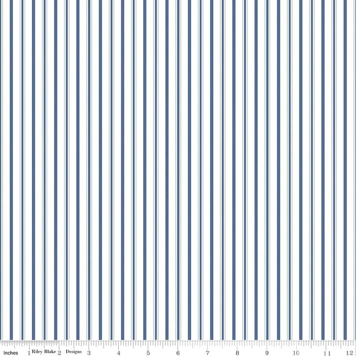 Image of Daybreak on the Prairie Track Stripe Blue quilting cotton fabric by Modern Prairie for Riley Blake Designs. Features stripes on a blue background. Cute Little Fabric Shop.