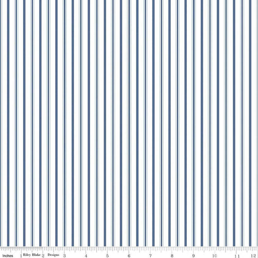 Image of Daybreak on the Prairie Track Stripe Blue quilting cotton fabric by Modern Prairie for Riley Blake Designs. Features stripes on a blue background. Cute Little Fabric Shop.