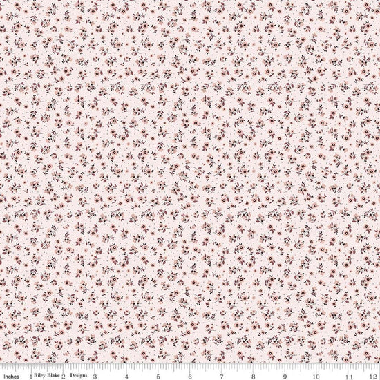Image of Daybreak on the Prairie Ditsy Pink quilting cotton fabric by Modern Prairie for Riley Blake Designs. Features flowers on a pink background. Cute Little Fabric Shop.