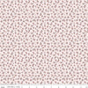 Image of Daybreak on the Prairie Ditsy Pink quilting cotton fabric by Modern Prairie for Riley Blake Designs. Features flowers on a pink background. Cute Little Fabric Shop.