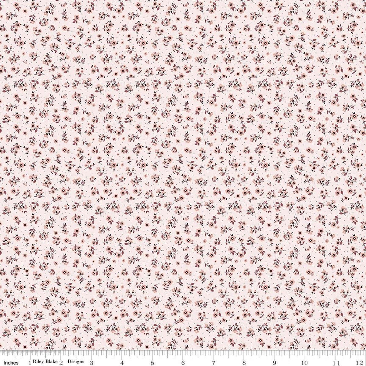 Image of Daybreak on the Prairie Ditsy Pink quilting cotton fabric by Modern Prairie for Riley Blake Designs. Features flowers on a pink background. Cute Little Fabric Shop.